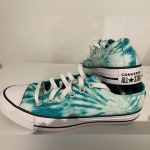 Super cute teal green tie-dyed converse all stars. Never worn. New condition.